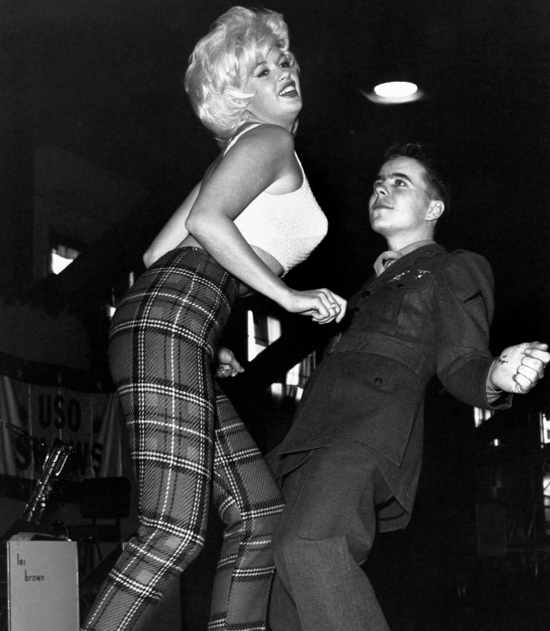 Twisting the Day Away! A Young, Happy Marine Dances the Twist With Jayne Mansfield - Newfoundland U.S. Naval Station, 1961 | Getty Images Photo by Bettmann