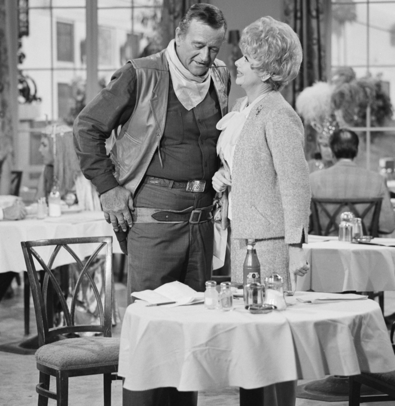 And Scene! Lucille Ball and John Wayne Posing During a Scene From “The Lucy Show” (1966) | Getty Images Photo by CBS Photo Archive