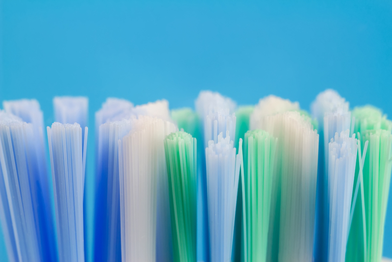 The Blue Bristles on a Toothbrush | Shutterstock