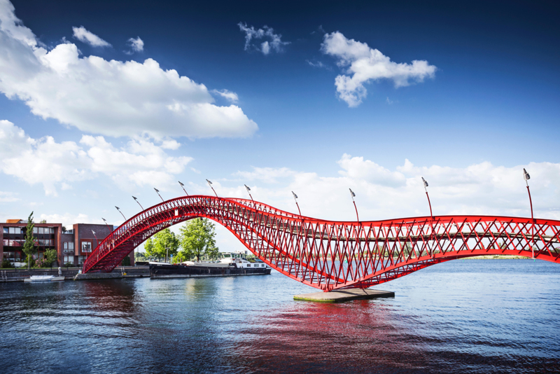 Python Bridge – Amsterdam, Netherlands | Alamy Stock Photo by Sebastian Grote/mauritius images GmbH