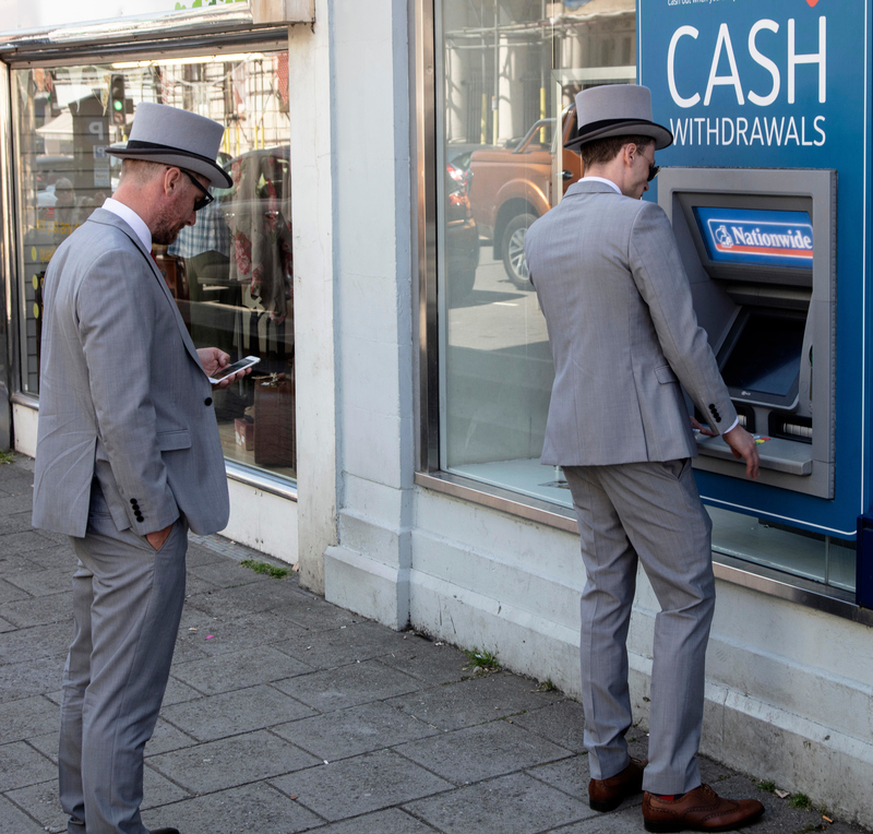 Top Hats at the ATM | Alamy Stock Photo