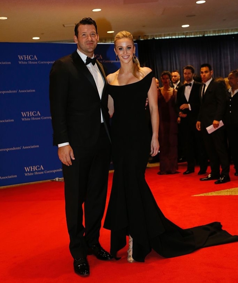 Tony Romo & Candice Crawford | Getty Images Photo by ANDREW BIRAJ/AFP