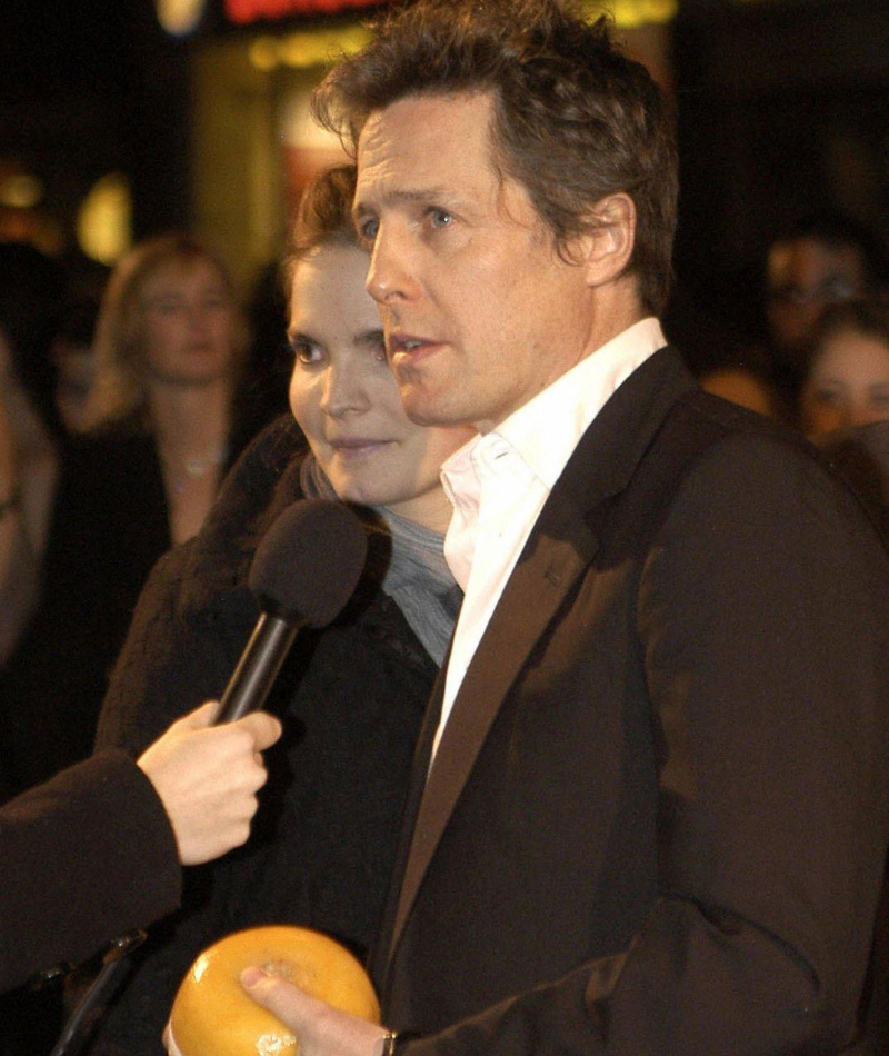 Hugh Grant Gets Cuffed | Getty Images Photo by PETER PIJLMAN/AFP