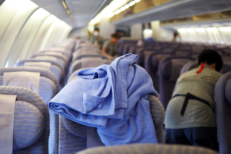Stay Away From Plane Blankets | Shutterstock Photo by litabit