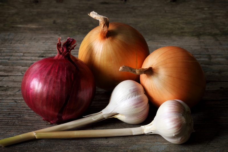 Put Onions and Garlic in Paper Bags | Getty Images Photo by Savushkin