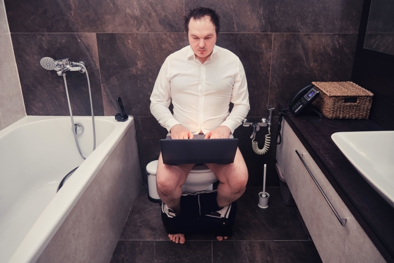 Use the Laptop in the Bathroom | Alamy Stock Photo
