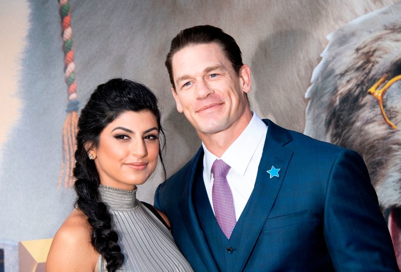 John Cena and Shay Shariatzadeh | Getty Images Photo by VALERIE MACON/AFP