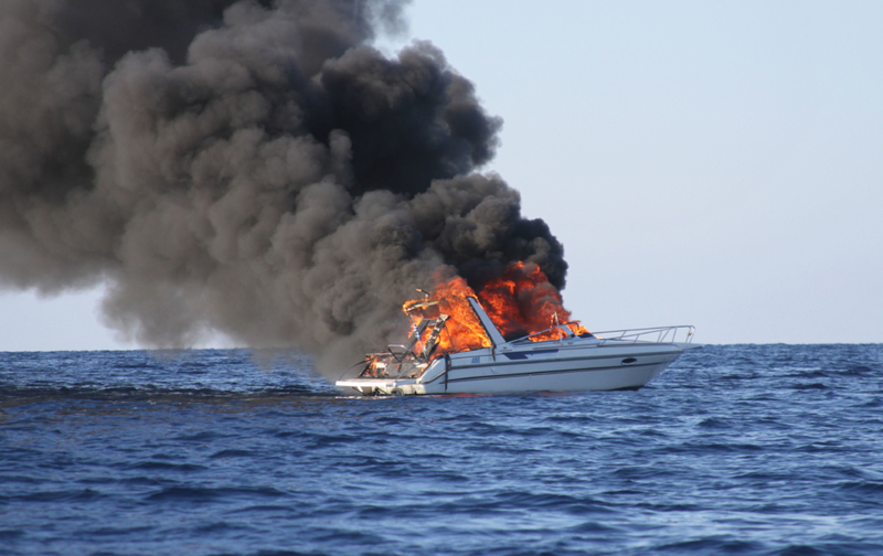 Boat on Fire | Alamy Stock Photo