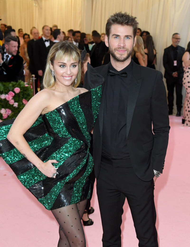 Miley Cyrus and Liam Hemsworth | Getty Images Photo by Karwai Tang