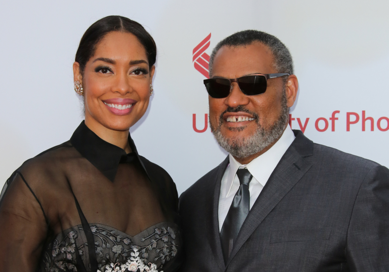 Gina Torres and Laurence Fishburne | Getty Images/Photo by Paul Archuleta/FilmMagic