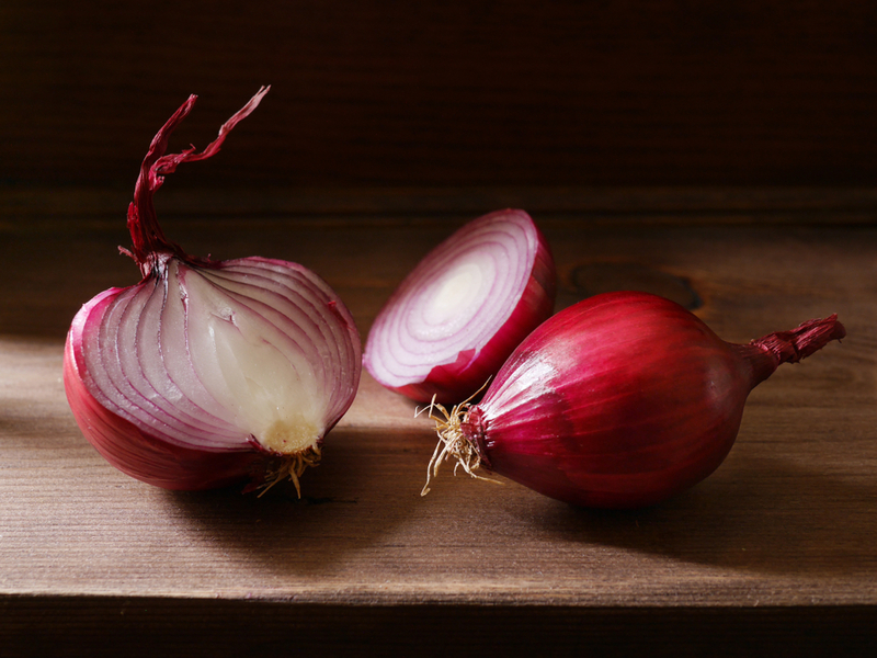 Remove Burn Stains With a Raw Onion | Shutterstock Photo by tanya_morozz