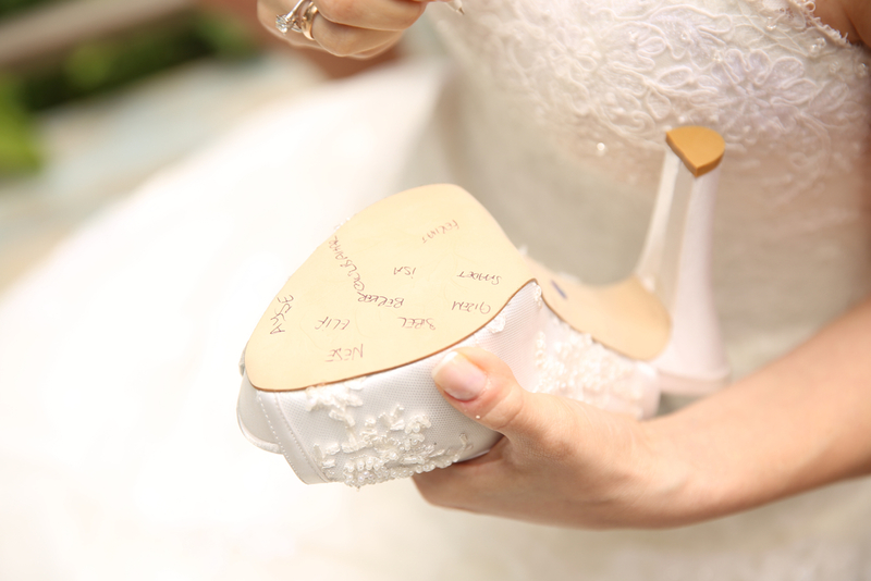 Signing the Bridal Shoes | Shutterstock