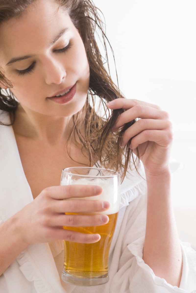 Using Beer on Your Hair | Alamy Stock Photo