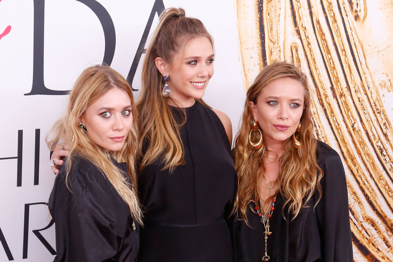Elizabeth Olsen, Mary-Kate, and Ashley Olsen | Getty Images Photo by Taylor Hill/FilmMagic