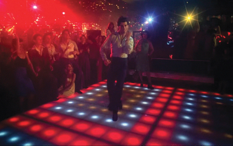 John Travolta Dancing to “You Should Be Dancing” in “Saturday Night Fever” | Alamy Stock Photo by Paramount/TCD/Prod.DB