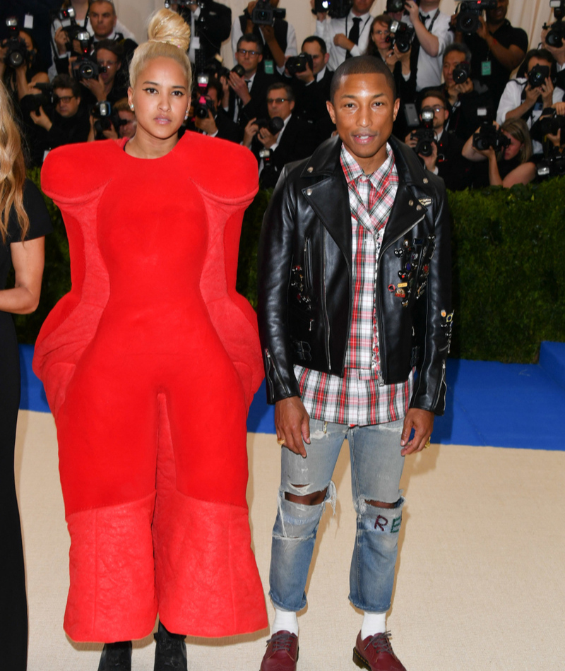Pharrell Williams and Helen Lasichanh | Getty Images Photo by George Pimentel/WireImage