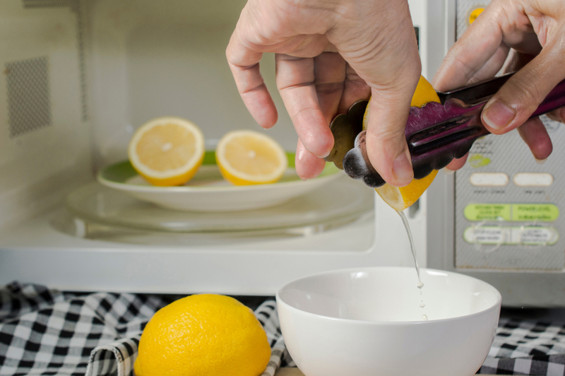 Use Tongs to Squeeze Out More Juice | Shutterstock
