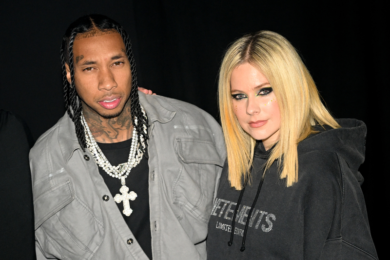 Tyga and Avril Lavigne | Getty Images Photo by Stephane Cardinale - Corbis