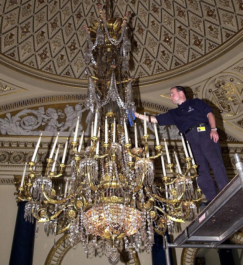 Chandelier Cleaning | Alamy Stock Photo by Michael Stephens/PA Images