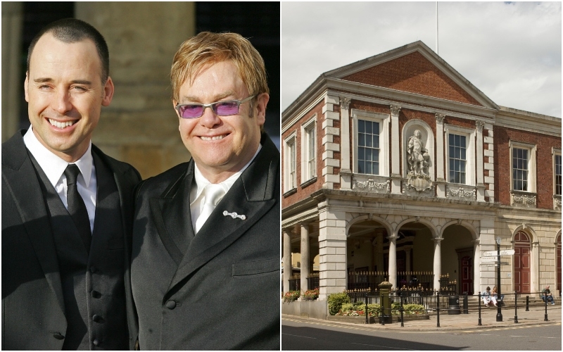 Elton John and David Furnish | Getty Images Photo by ODD ANDERSEN/AFP & Alamy Stock Photo