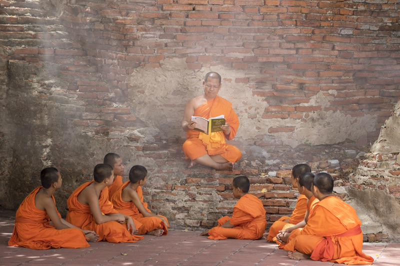 Monk Business | Shutterstock Photo by Chutima Chaochaiya