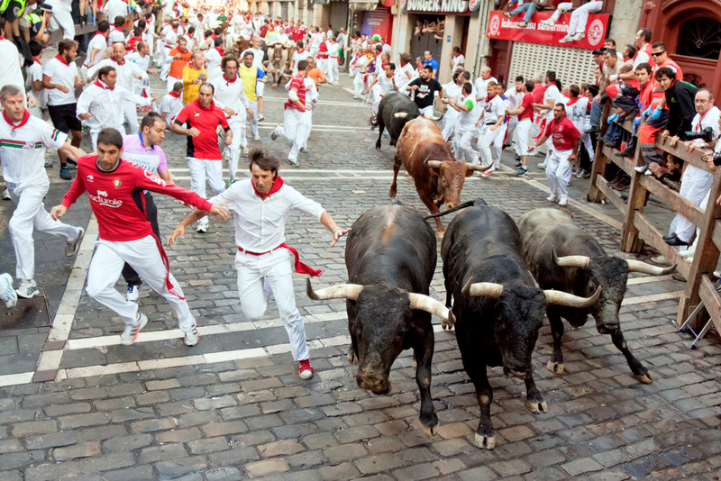 Running of the Bulls – Pamplona, Spain | Shutterstock Photo by Migel