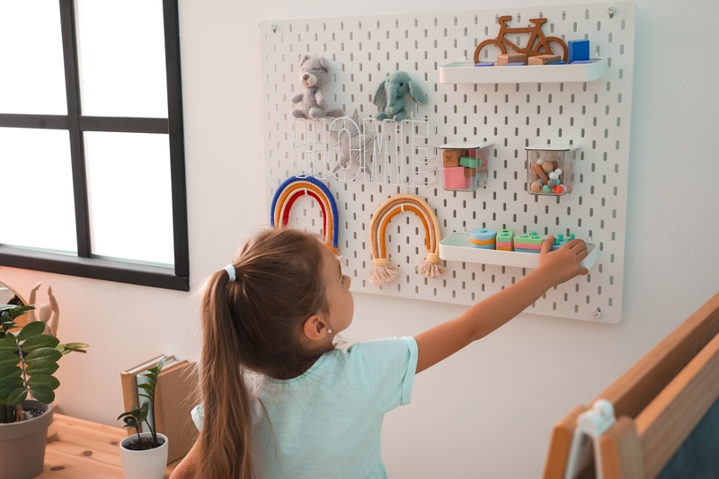 Turn a Peg Board into a Play Wall | Shutterstock Photo by Pixel-Shot
