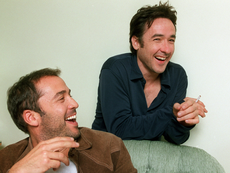 John Cusack & Jeremy Piven | Getty Images Photo by Gary Friedman/Los Angeles Times