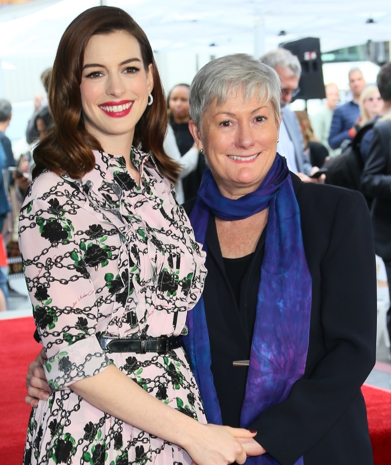 Anne Hathaway and Kate McCauley | Getty Images Photo by JEAN-BAPTISTE LACROIX/AFP