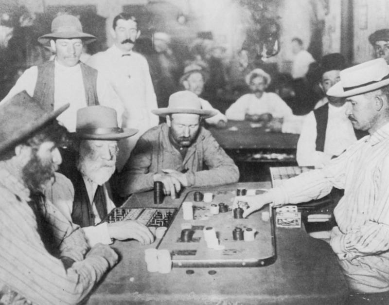 Cowboys Playing Poker | Alamy Stock Photo by Alto Vintage Images
