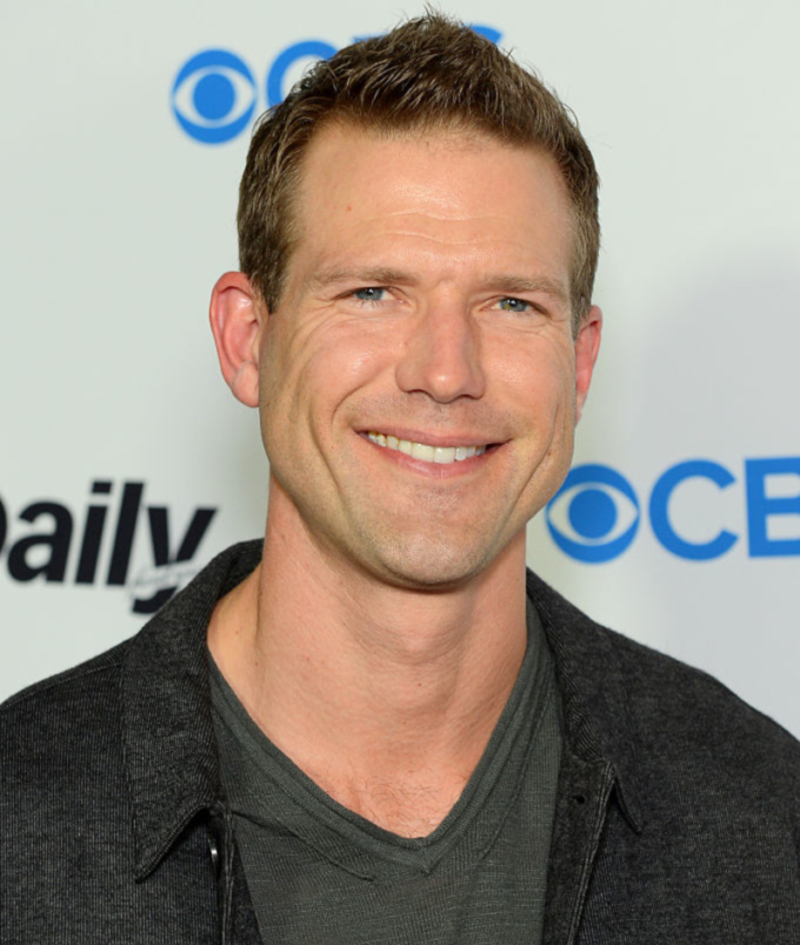 Now: Travis Lane Stork | Getty Images Photo by Andrew Toth/WireImage